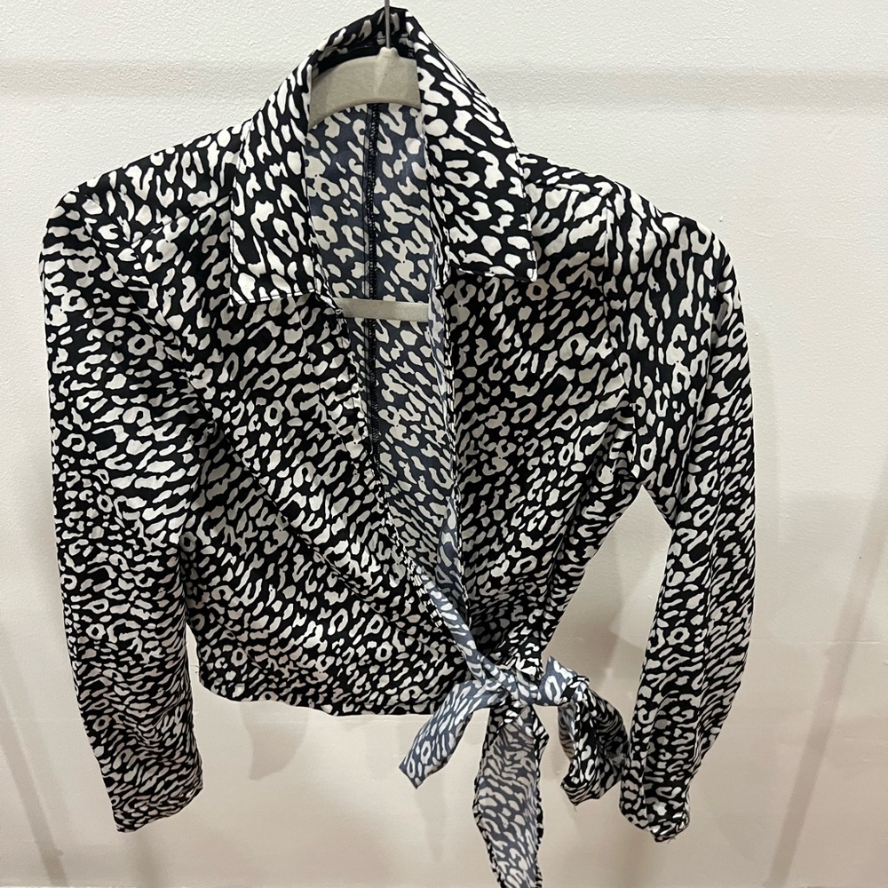 Black and white wrap blouse